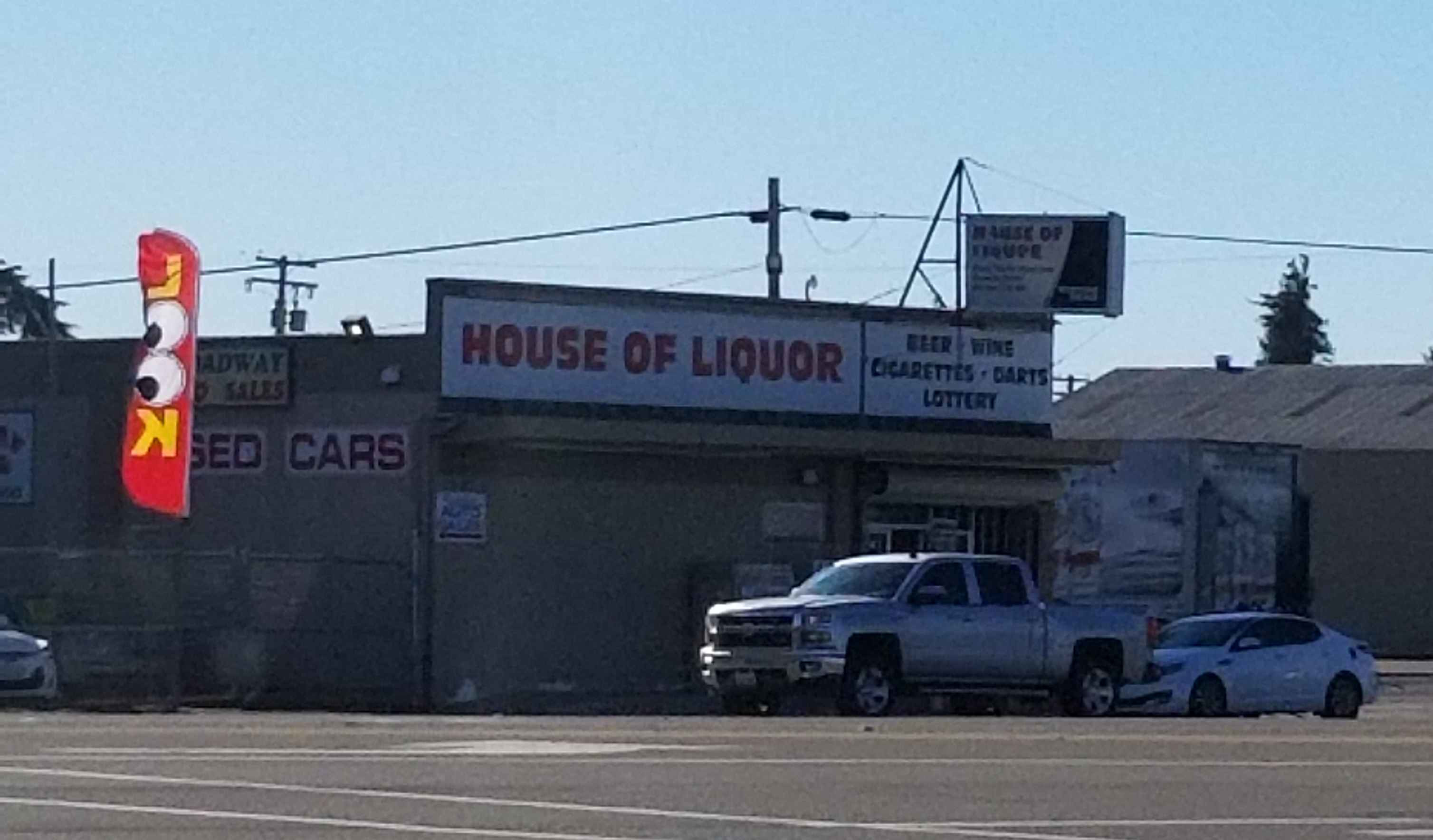 a corner store with signage